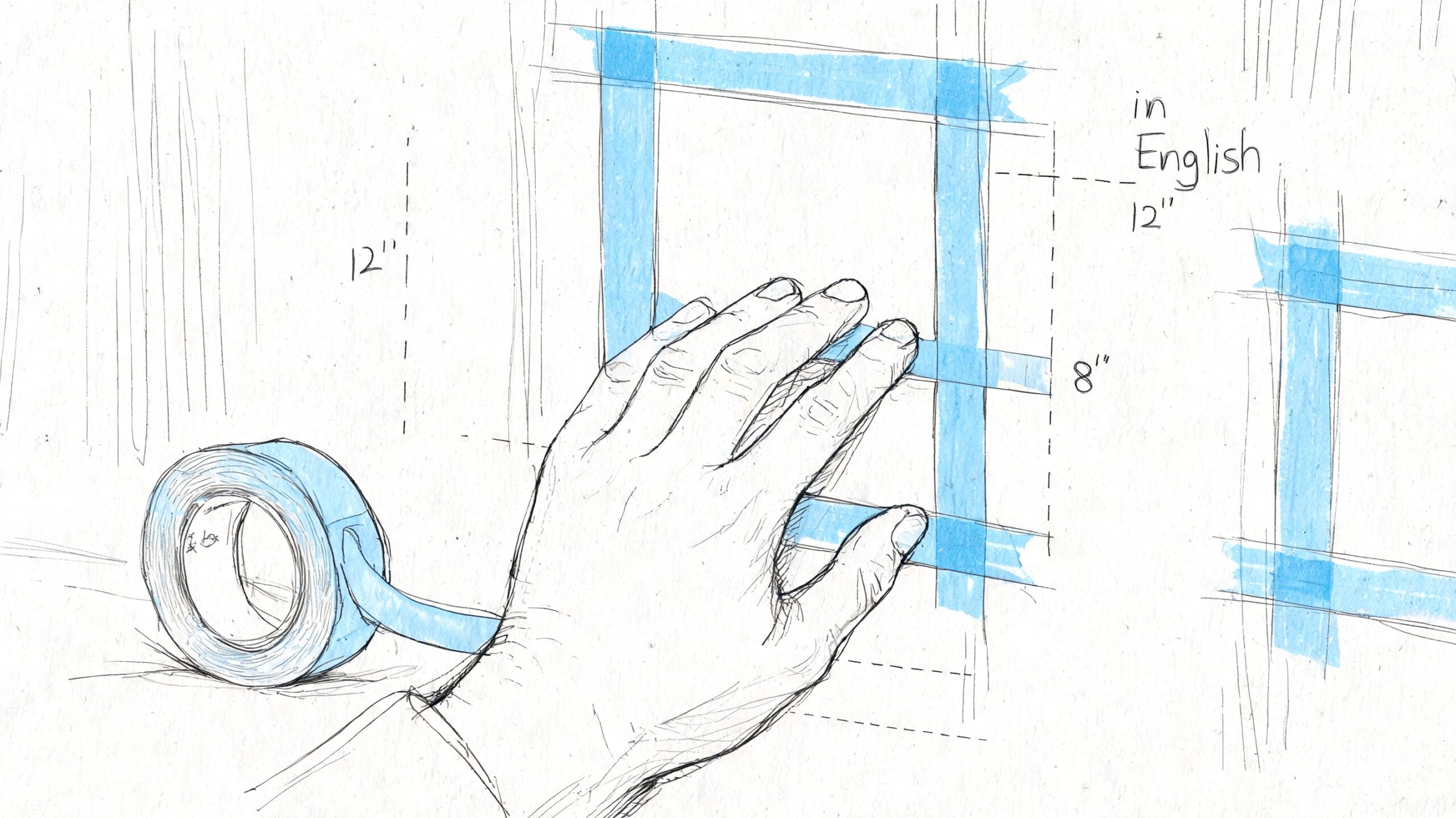 A hand using blue painter tape to mark a twelve by eight inch square on a wall.